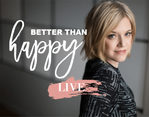 A woman with short blonde hair looks at the camera. Text over the image reads "Better Than Happy LIVE" in large, decorative font.